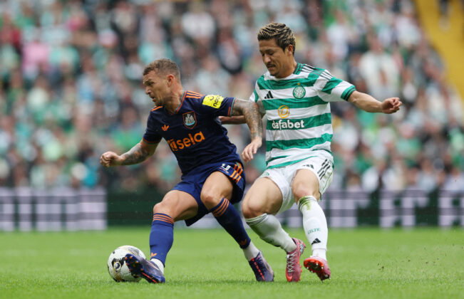 Newcastle United's Kieran Trippier in action with Celtic's Daizen Maeda