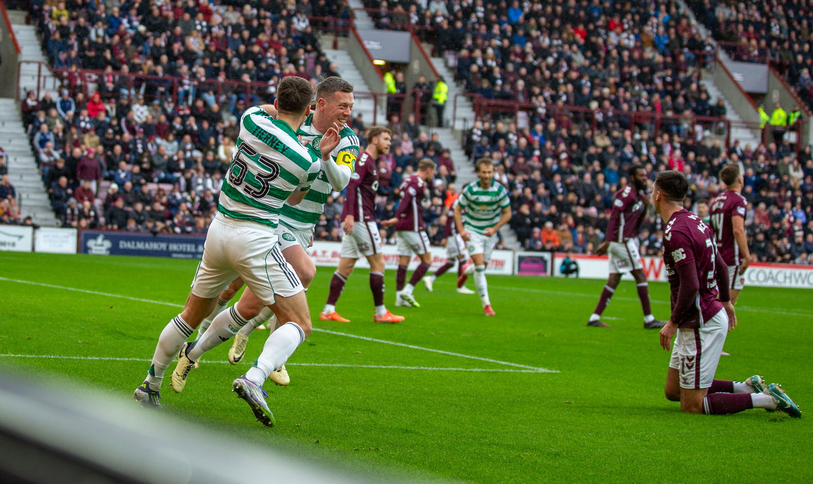Celtic captain Callum McGrgeor Celebrates Tynecastle