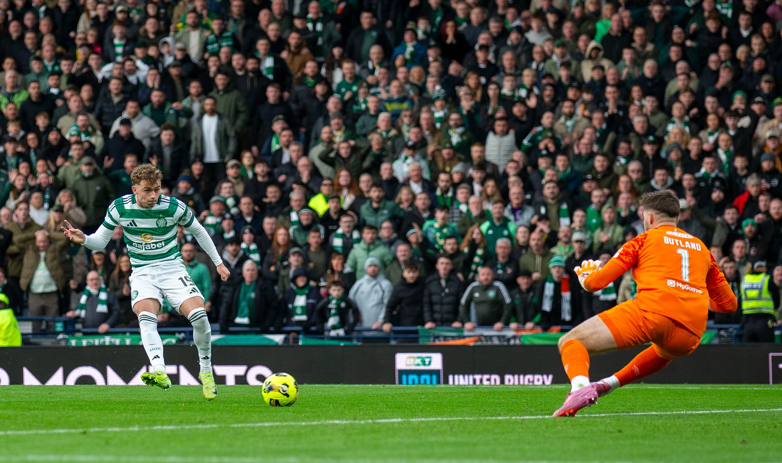 Celtic FC Callum Osmand Shoots into Rangers FC Goalkeeper Jack Butland
